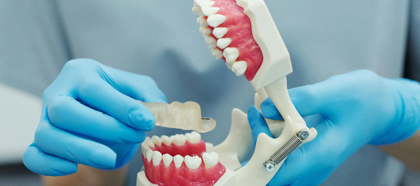 Restore damaged or missing teeth with custom crowns and full or partial dentures.